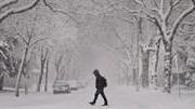 man walking in snow